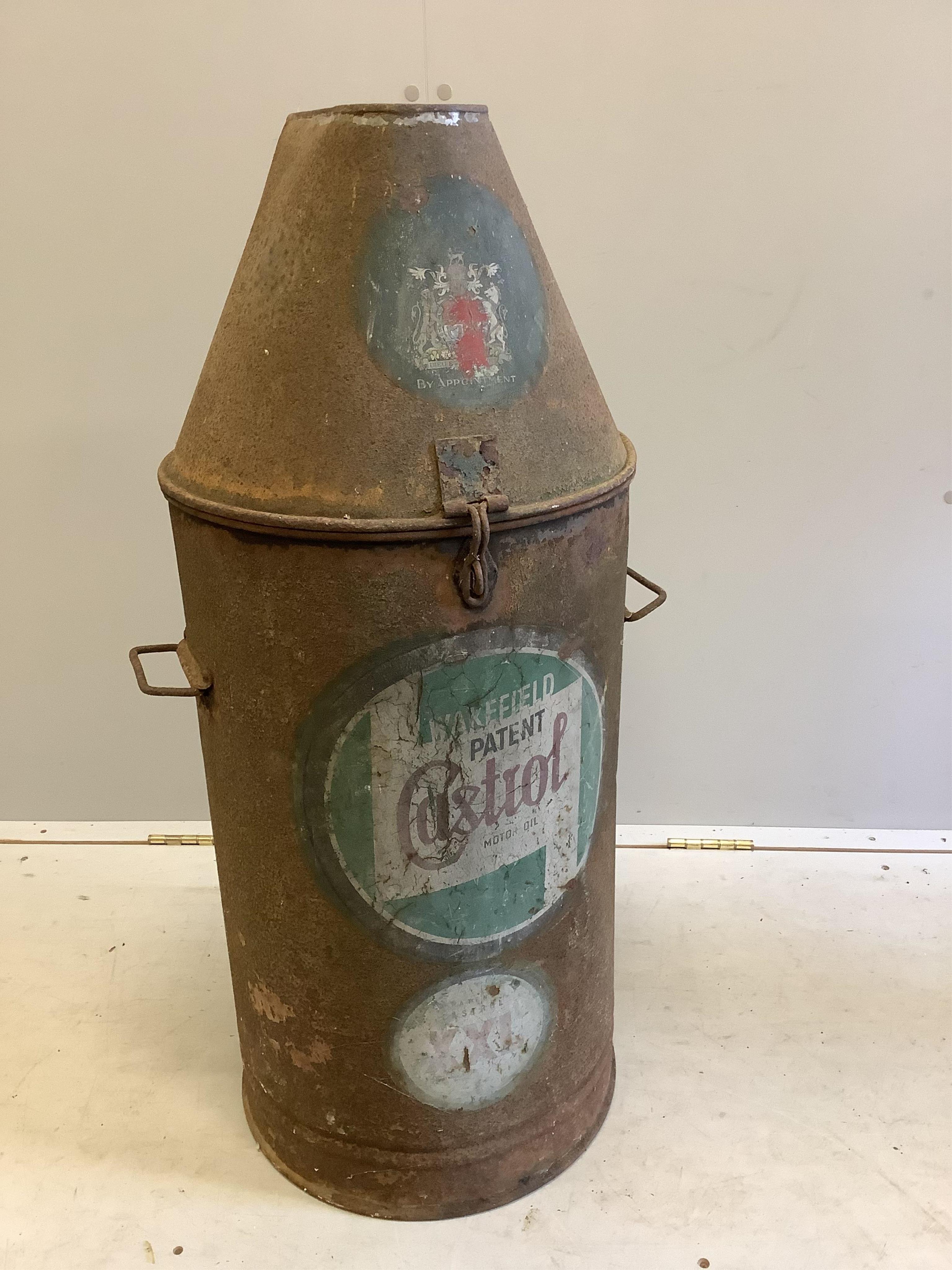 A large vintage Castrol oil dispensing drum, height 88cm. Condition - poor to fair